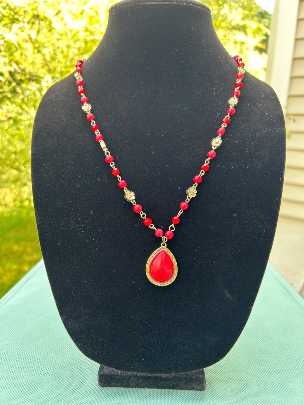 Gold-Tone Necklace with Red Teardrop Pendant